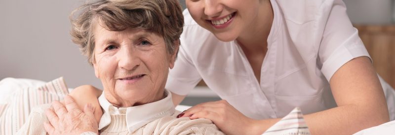 senior home care services provided by a young lady to a senior woman